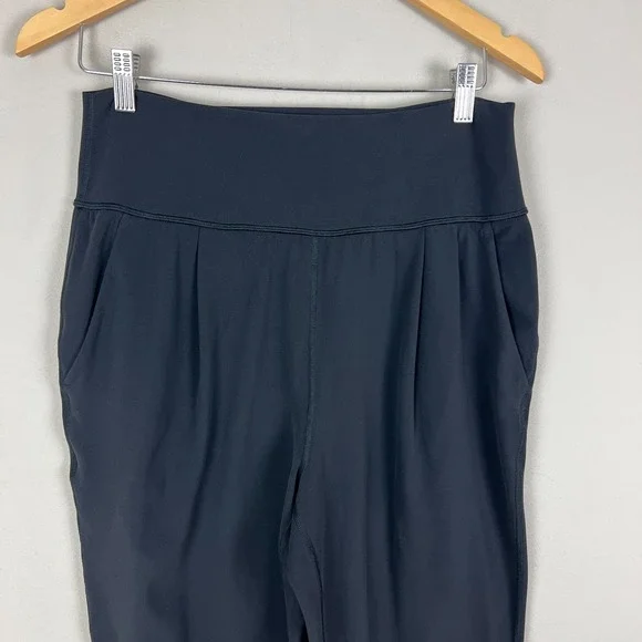 Athleta Elation Pants Women Medium Black Tapered Pleated Stretch Knit Athleisure - Picture 2 of 14